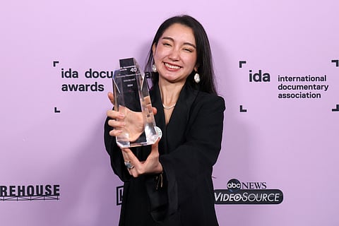 Shiori Ito poses with the Emerging Filmmaker Award for "Black Box Diaries" during The 40th IDA Documentary Awards at The Orpheum Theatre on December 05, 2024 in Los Angeles, California.