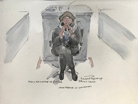 This court sketch created on February 26, 2025, shows Marie-France Le Scouarnec ex-wife of French retired surgeon Joel Le Scouarnec during his trial on charges of assaulting or raping 299 patients, at the Criminal Court in Vannes.