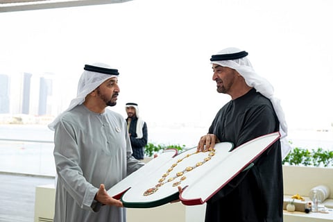 Sheikh Mohamed bin Zayed Al Nahyan presents the Order of the Mother of the Nation to Sheikh Hamdan bin Zayed Al Nahyan during the seventh session of the Sheikha Fatima bint Mubarak Excellence and Community Intelligence Program Award Ceremony in Abu dhabi on Wednesday.