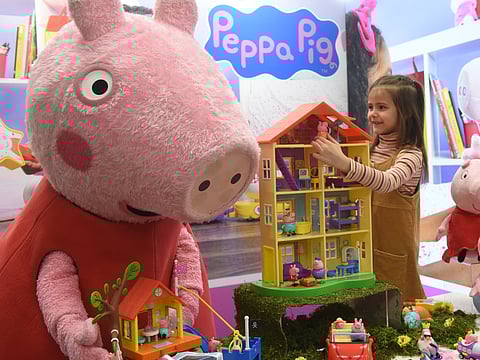 Young girl Daria plays with Peppa Pig toys at the booth of Jazwares company during the press preview of the international toys fair Spielwarenmesse in Nuremberg, southern Germany.