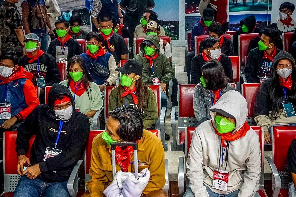 Indonesian nationals, who were victims of human trafficking in Myanmar, arrive at Soekarno–Hatta International Airport in Tangerang, Banten province, on February 28, 2025, after being flown from Thailand, following their handover by the Myanmar government to Thailand.