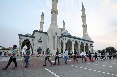 Residents arrive for the first iftar of the holy month of Ramadan at the Al Farooq Omar Bin Al Khattab Mosque, popularly known as theBlue Mosque, in Dubai. Photo: Virendra Saklani/Gulf News
