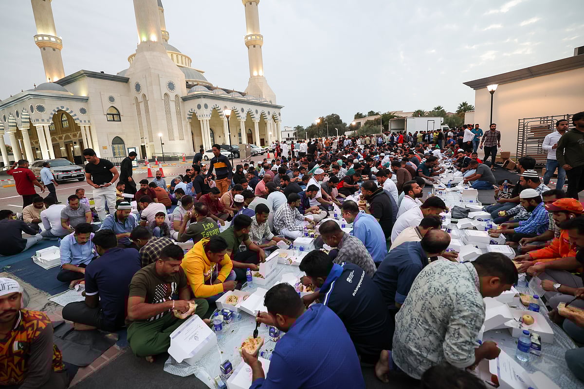 Residents enjoy the first iftar of the holy month of Ramadan at the Al Farooq Omar Bin Al Khattab Mosque, popularly known as the Blue Mosque, in Dubai (from March 1, 2025). 