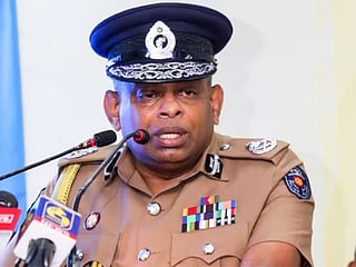 Sri Lanka hunts for police chief over deadly raid