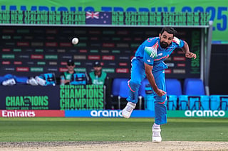 India's Mohammed Shami bowls during the ICC Champions Trophy one-day international (ODI) cricket match between New Zealand and India at the Dubai International Stadium in Dubai on March 2, 2025.