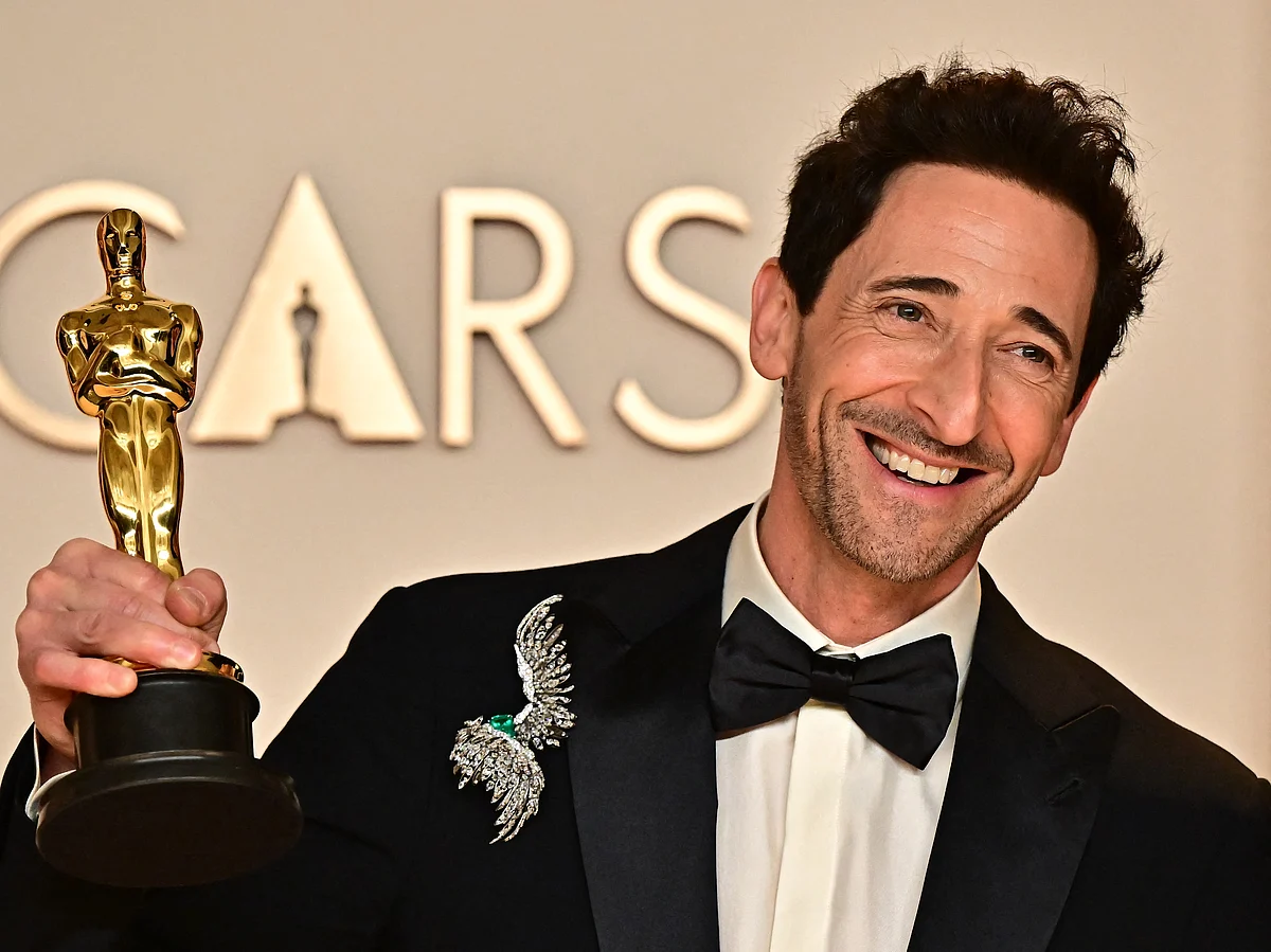 Actor Adrien Brody with his award