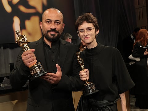 Hamdan Ballal and Rachel Szor, winners of the Best Documentary Feature Film for "No Other Land", attend the 97th Annual Oscars Governors Ball at Ovation Hollywood Complex on March 02, 2025 in Hollywood, California.