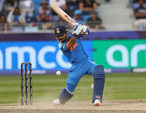 India's Virat Kohli  plays a shot against Australia in the Champions Trophy semi final match at Dubai International stadium on Sunday. 