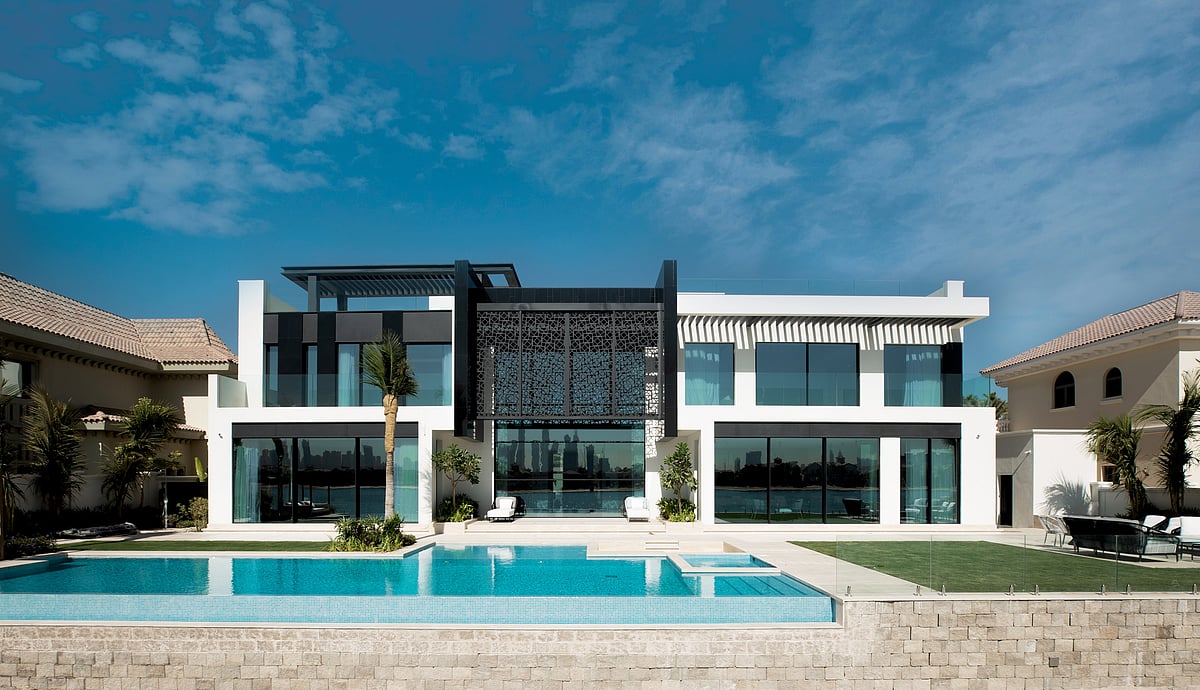 The outdoor space of the Signature Villa offers stunning views of the Arabian Gulf and Ain Dubai.