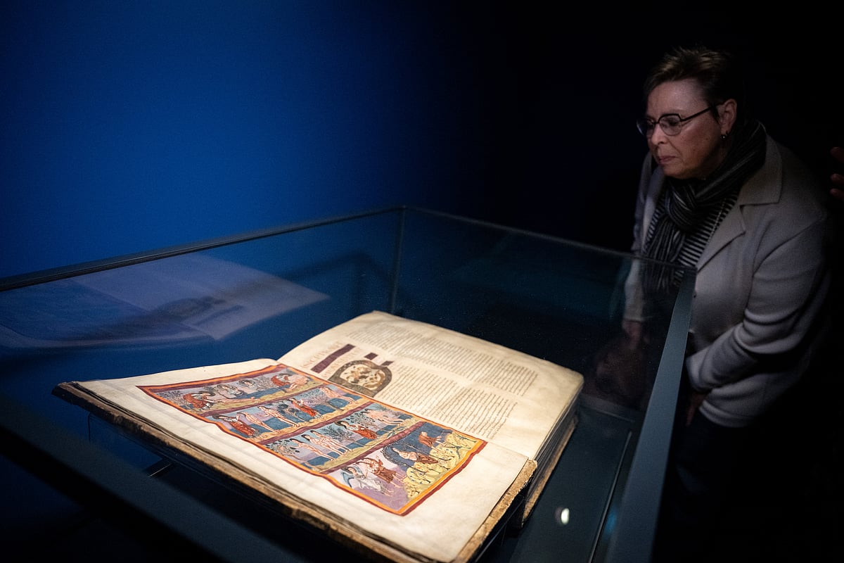 A journalist looks at the Moutier-Grandval Bible, a 9th century illustrated bible, one of the oldest fully preserved bibles in the world.