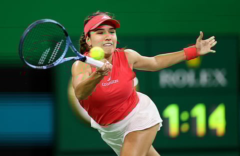 Camila Osorio of Columbia plays a forehand against Naomi Osaka of Japan in their first round match during the BNP Paribas Open at Indian Wells Tennis Garden on March 5 in Indian Wells, California.