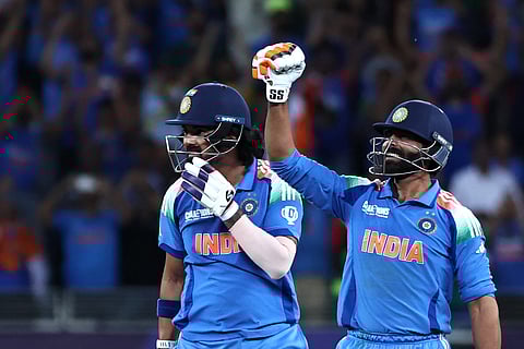 India's KL Rahul (left) and Ravindra Jadeja celebrate their victory at the end of the ICC Champions Trophy One-Day International (ODI) final cricket match at the Dubai International Stadium in Dubai on March 9.