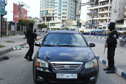 Syrian forces manning a checkpoint in Latakia on March 9, 2025.
