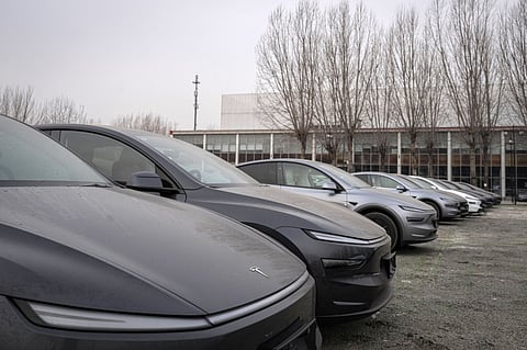 Tesla Vehicles and showrooms in Beijing as Automaker's China sales slump adds to worrying global slowdown