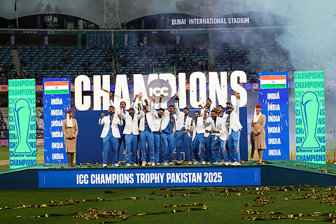 Indian team celebrate after winning the Champions Trophy 2025 with a four-wicket win over New Zealand in the final at Dubai International Stadium on Sunday.