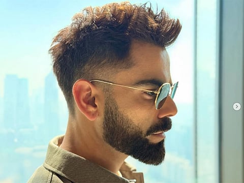 Indian star cricketer Virat Kohli flaunts a new haircut ahead of IPL 2025