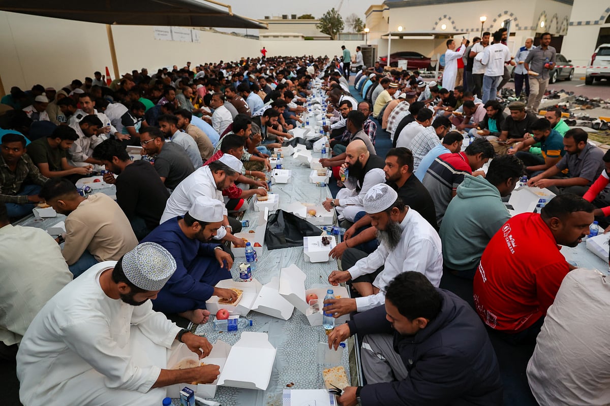 Residents enjoy the first iftar of the holy month of Ramadan at the Al Farooq Omar Bin Al Khattab Mosque, popularly known as the
Blue Mosque, in Dubai. 