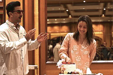 Bollywood actor Ranbir Kapoor (L) takes part in the birthday celebrations of his actress wife Alia Bhatt, in Mumbai on March 13, 2025.