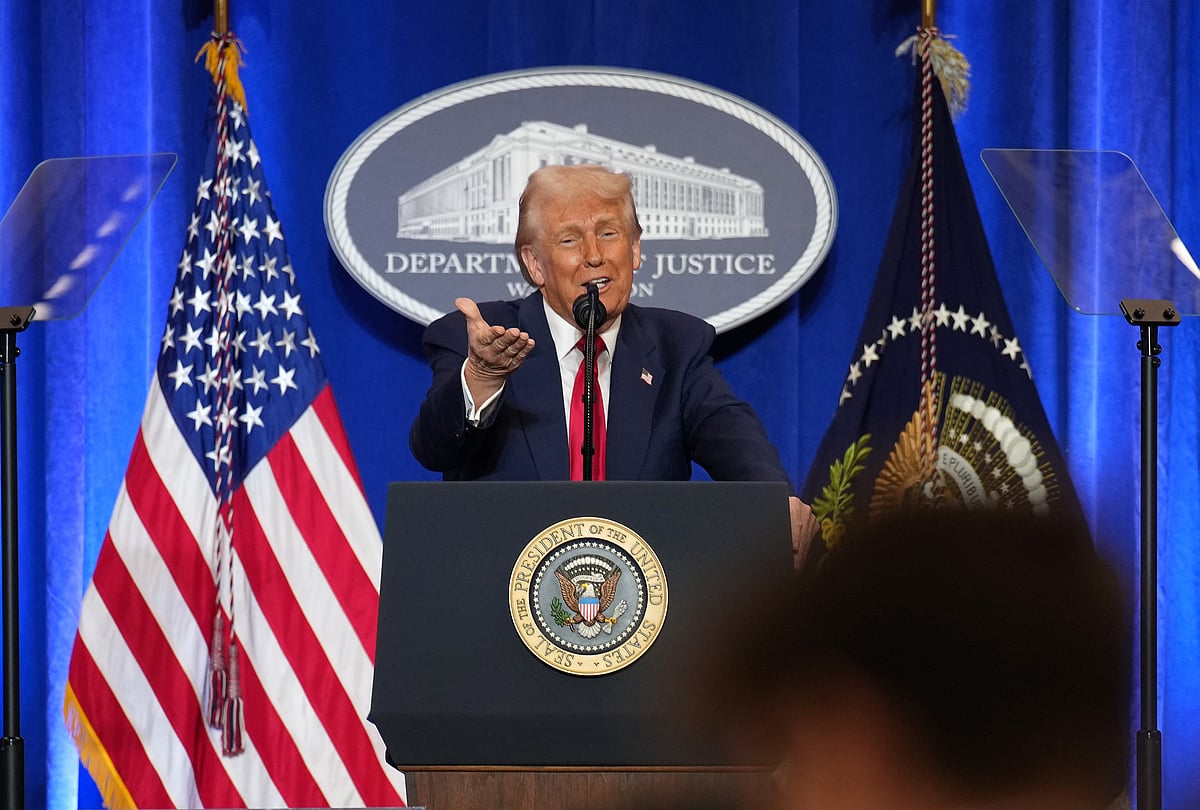 US President Donald Trump gestures while speaking at the Justice Department in Washington, DC. 