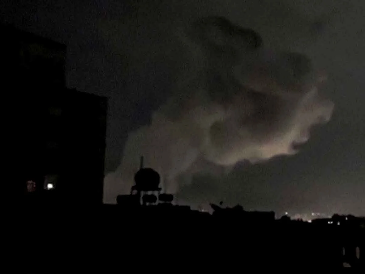 This grab from AFPTV footage shows smoke plumes rising following bombardment on Yemen's Houthi-controlled capital Sanaa on March 15, 2025. 