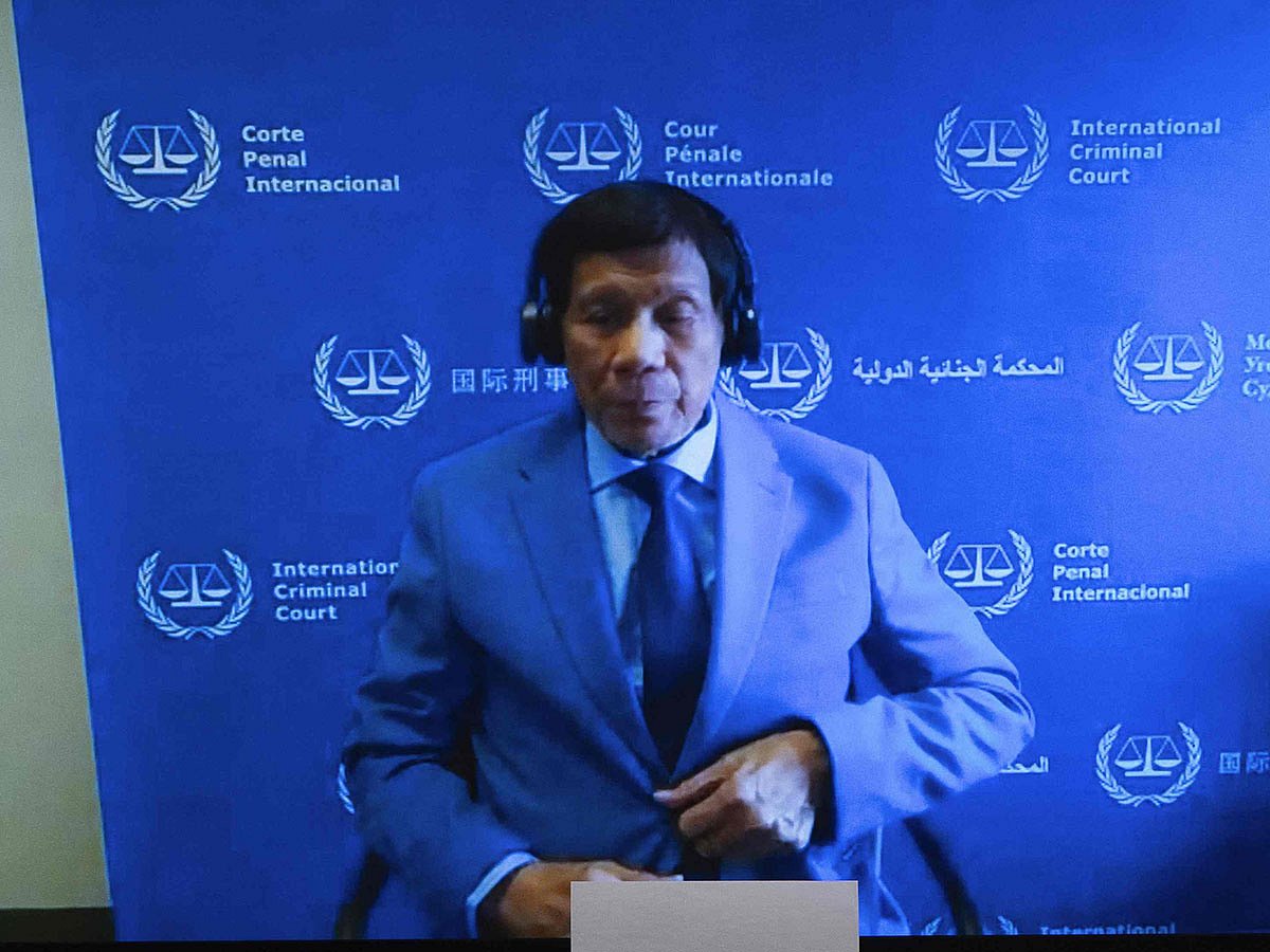Former Philippine President Rodrigo Duterte is seen on a screen in the courtroom during his first appearance before the International Criminal Court (ICC) on charge of crimes against humanity over his deadly crackdown on narcotics, in The Hague on March 14, 2025.