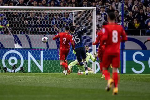 Japan's Daichi Kamada scores the goal during the 2026 Fifa World Cup Asian qualification football match against Bahrain in Saitama on March 20.