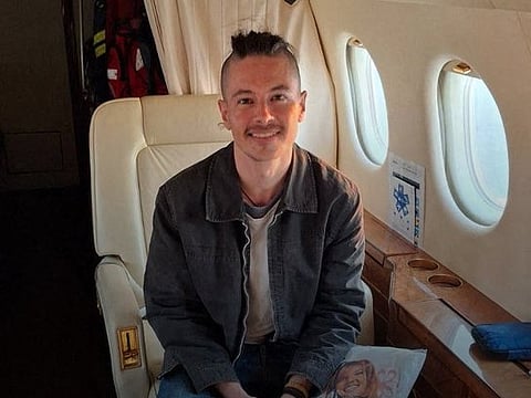 A picture obtained from the X account of France's Foreign Minister Jean-Noel Barrot, on March 20, 2025, shows French citizen Olivier Grondeau aboard a plane after being released by Iranian authorities.