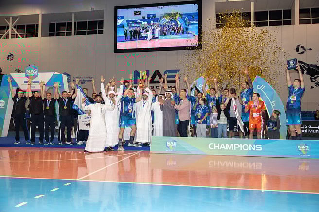 Dr. Ahmad Belhoul Al Falasi, Minister of Sports; Khalfan Belhoul, Vice-Chairman of Dubai Sports Council; and Hassan Al Mazrouei, Tournament Director along with padel tournament winners Pablo Arriber and Cesar Freire.