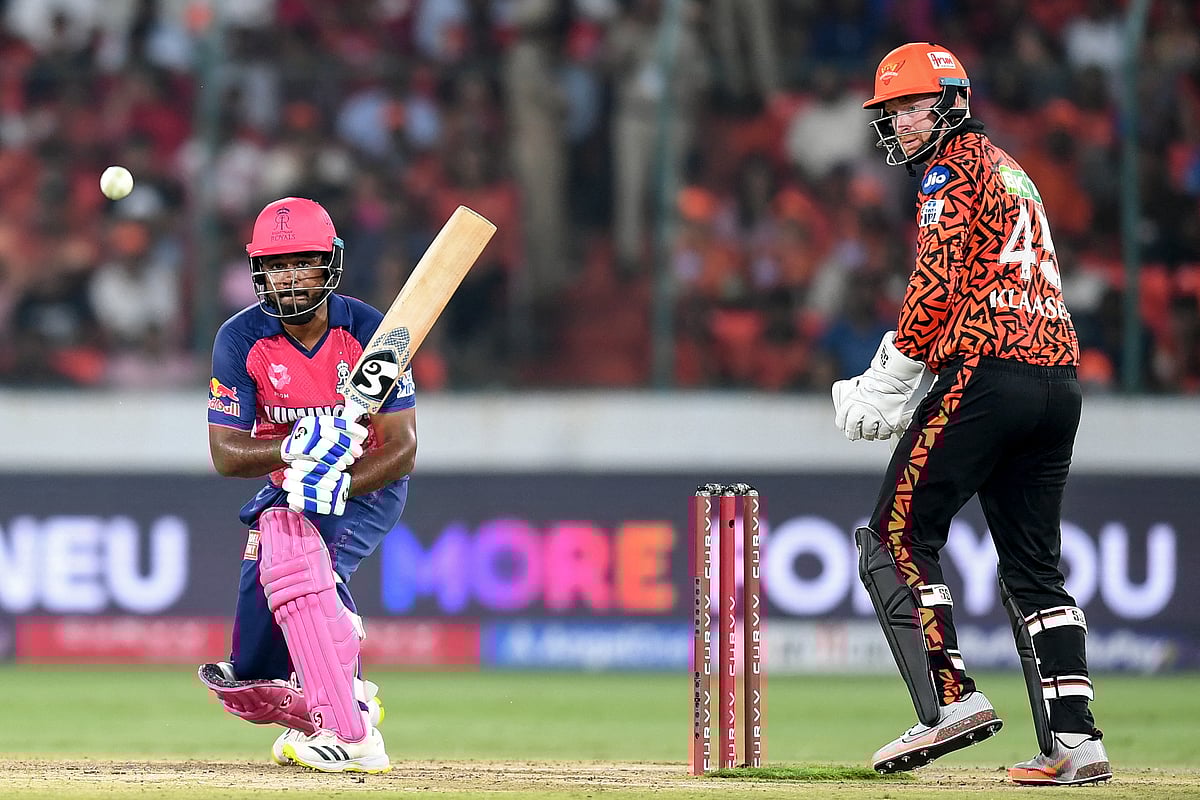 Rajasthan Royals' captain Sanju Samson in action as Sunrisers Hyderabad's wicketkeeper Heinrich Klaasen watches during the Indian Premier League (IPL) Twenty20 cricket match at the Rajiv Gandhi International Stadium in Hyderabad on March 23.