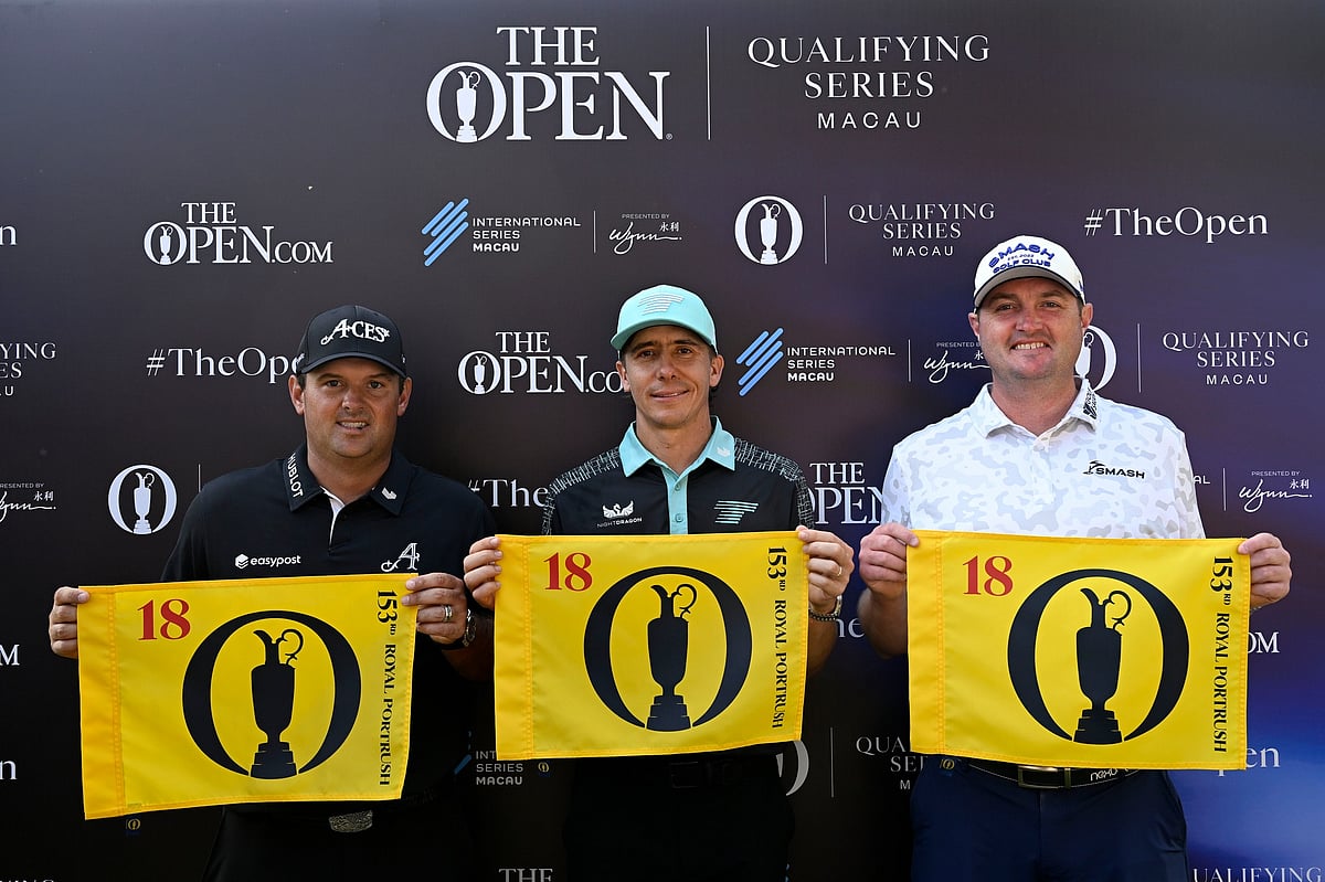 L-R Patrick Reed, Carlos Ortiz and Jason Kokrak pictured with The Open flags after qualifying for The Open by finishing in the top three at Macau Golf and Country Club