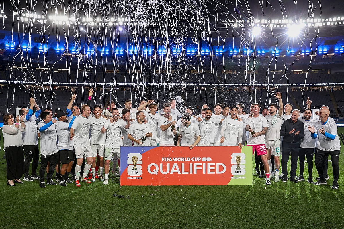 New Zealand's team celebrate after their victory during the Fifa World Cup 2026 Oceania qualifiers group final football match against New Caledonia at Eden Park Stadium in Auckland on March 24.