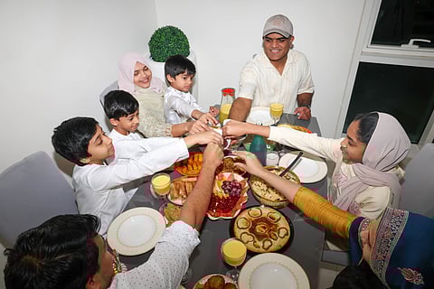 NISAR K.K family gathering on  Iftar Food table at AD Photo: