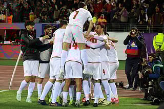 Iran's players celebrate after scoring during the FIFA World Cup 2026 Asia zone qualifiers group A football match between Iran and Uzbekistan, on March 25, 2025 in Tehran.