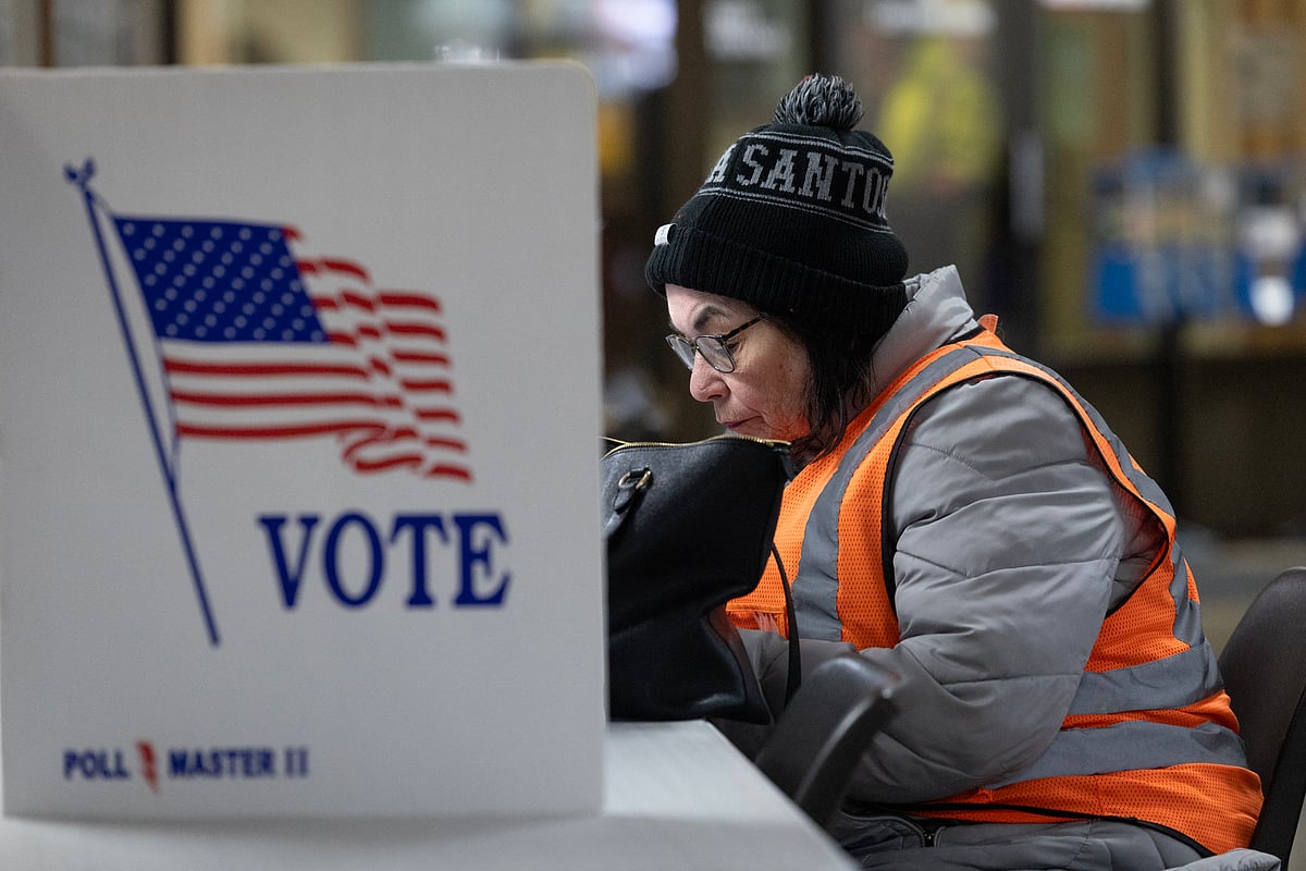 A resident participates in in-person absentee voting (early voting) at the Municipal Building on March 26, 2025 in Kenosha, Wisconsin.