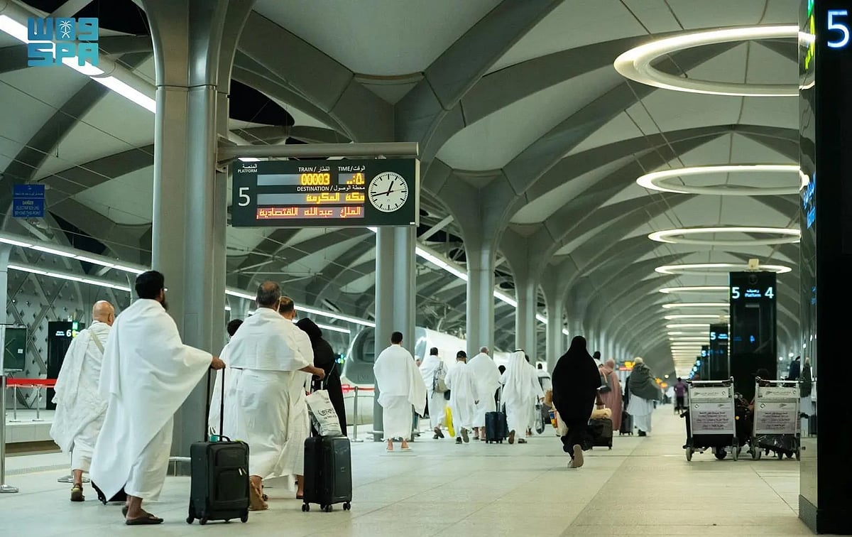 Pilgrims on way to board the high-speed Haramain train that connects the Saudi holy cities of Mecca and Medina. 