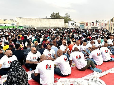 Members of the UAE chapter of Motta Global at the iftar they organised for workers in Sharjah.