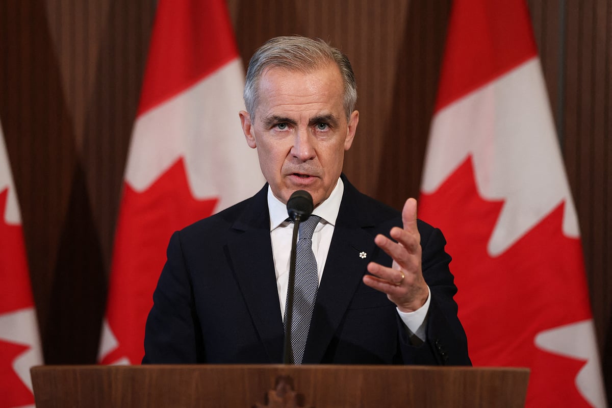 Canada's Prime Minister Mark Carney speaks to the media after meeting with his cabinet to deal with the US auto tariffs on Parliament Hill in Ottawa, Canada, on March 27, 2025