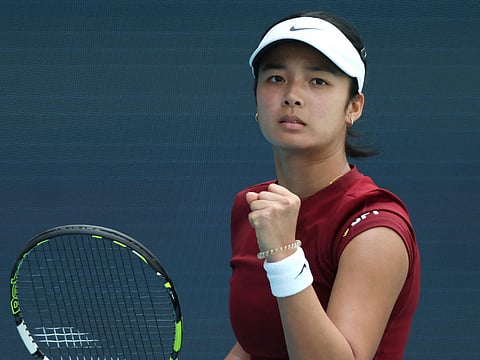 Alexandra Eala of the Philippines reacts after winning a point against Iga Swiatek of Poland