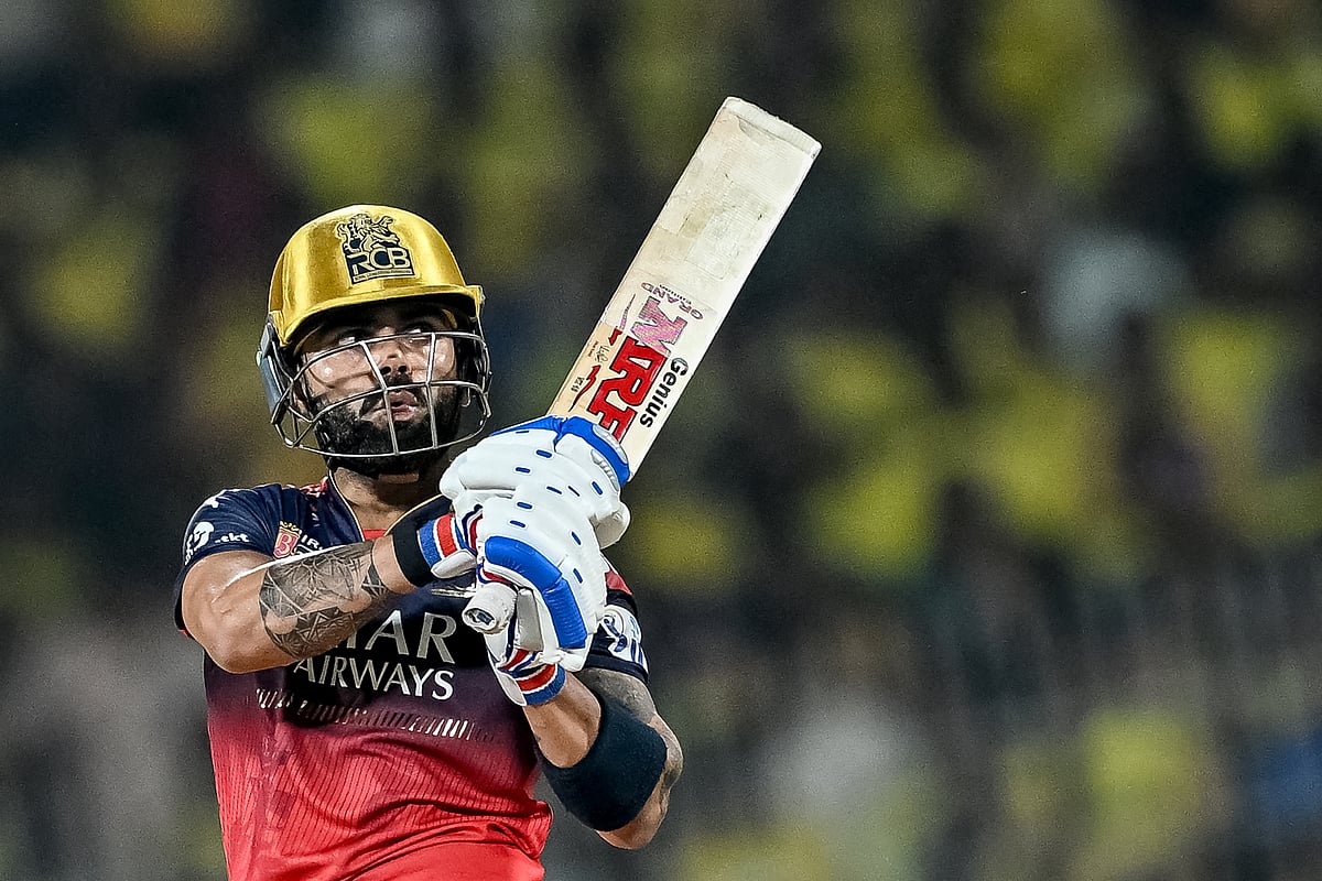 Royal Challengers Bengaluru's Virat Kohli watches the ball after playing a shot during the Indian Premier League (IPL) Twenty20 cricket match against Chennai Super Kings at the MA Chidambaram Stadium in Chennai on March 28.