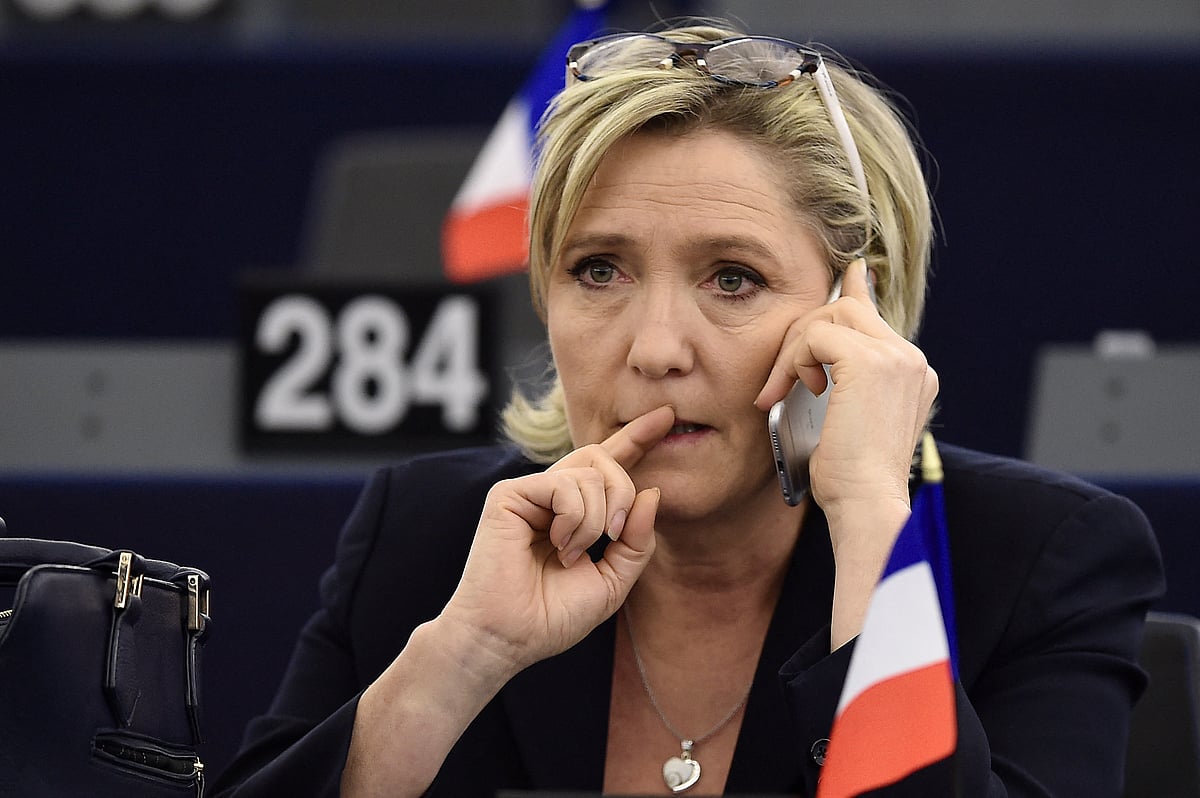 French Front National (National Front - FN) far-right party's President, European MP and presidential candidate for the 2017 election Marine Le Pen (L) takes part in a plenary session of the European Parliament marking the election of its new President in Strasbourg, eastern France, on January 17, 2016.