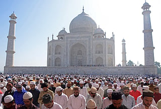 Muslims offer prayers during Eid Al Fitr inside the complex of the Taj Mahal in Agra on March 31, 2025.The petitioners have also sought a declaration that the Taj Mahal is a Hindu temple and permission for Hindus to perform darshan and prayers at the site
