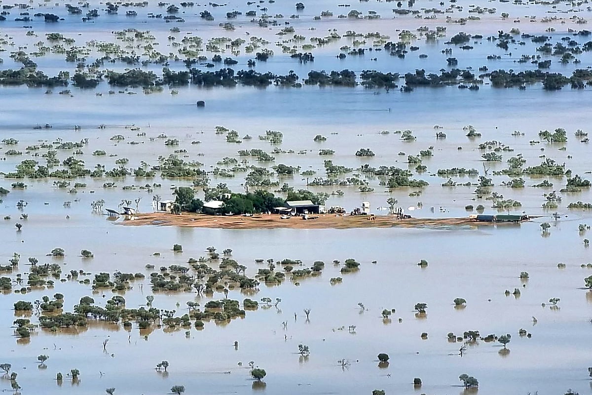 This handout photo taken on March 29, 2025 and released by The Queensland Fire Department shows a homestead under floodwaters near the town of Jundah in south-west Queensland.