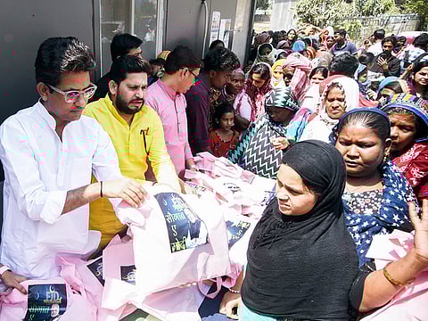 Bharatiya Janata Party (BJP) leaders distribute the 'Saugat-e-Modi' kits to poor Muslim families, at High Court Mazar, in Patna on Thursday, March 27, 2025. 