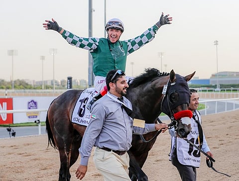 Italian jockey Frankie Dettori celebrates after Raging Torrent clinched the Godolphin Mile, his eighth success in the Group 2 race at Meydan on Saturday.