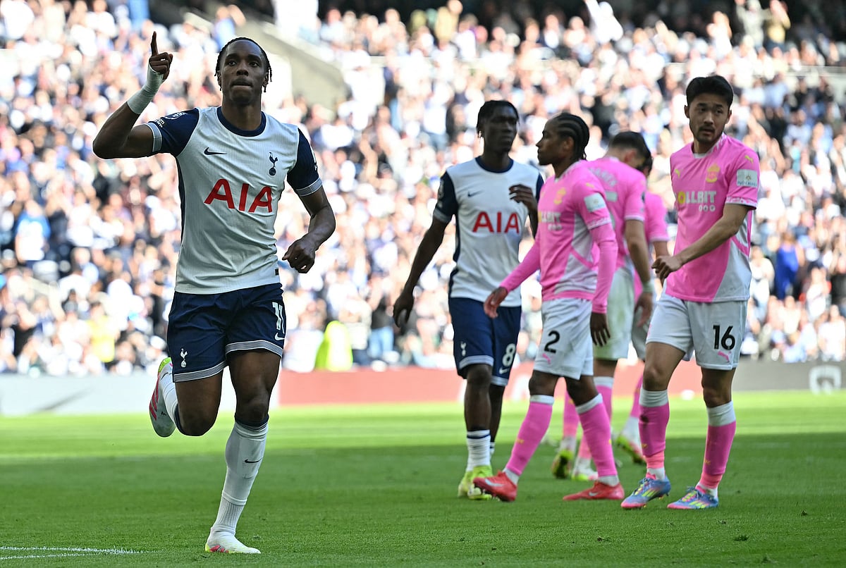Tottenham Hotspur's French striker Mathys Tel celebrates scoring the team's third goal from the penalty spot during the English Premier League football match against Southampton at the Tottenham Hotspur Stadium in London, on April 6.