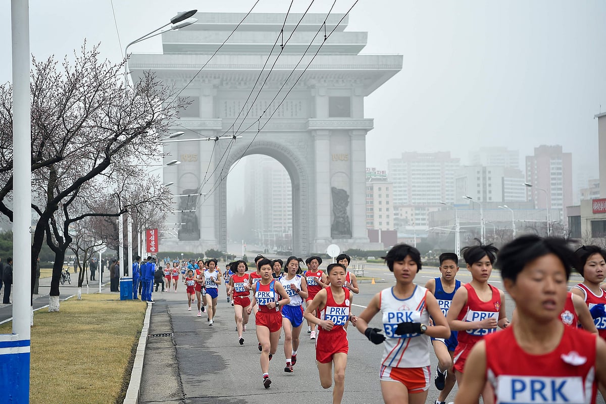 Participants take part in the 31st Pyongyang International Marathon in Pyongyang on April 6.