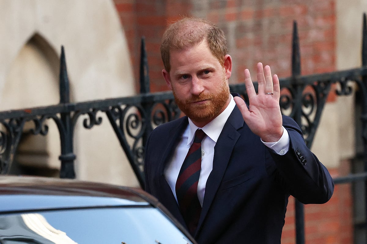 Britain's Prince Harry, Duke of Sussex waves as he departs the the Royal Courts of Justice, Britain's High Court, in central London, on April 9, 2025 following the second day of his appeal hearing to over the downgrading of his personal security during visits in Britain.