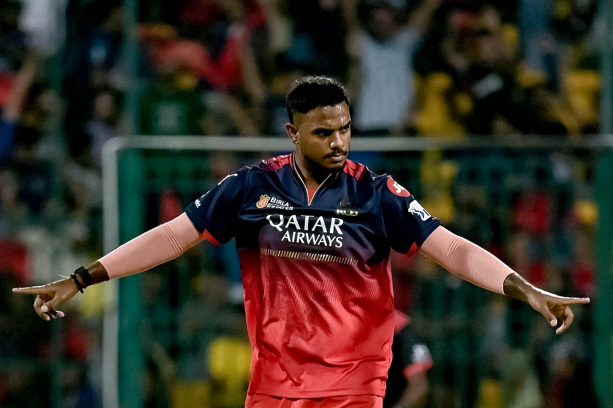 Royal Challengers Bengaluru's Yash Dayal celebrates after taking the wicket of Delhi Capitals' Faf du Plessis during the Indian Premier League (IPL) Twenty20 cricket match between Royal Challengers Bengaluru and Delhi Capitals at the M Chinnaswamy Stadium in Bengaluru on April 10, 2025.