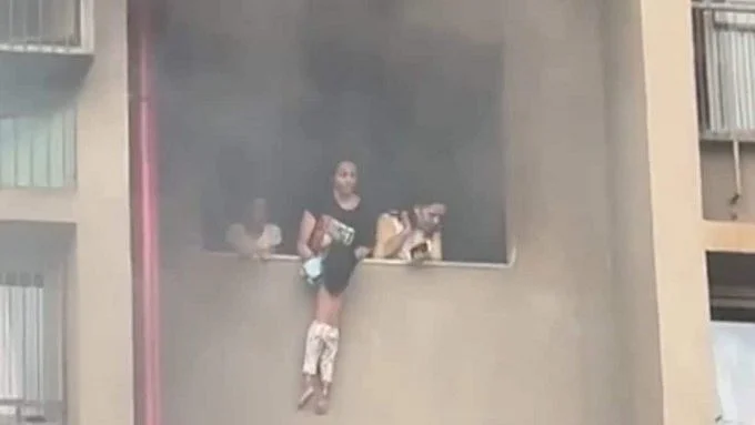 Firefighters rescue woman and child from high-rise fire in Ahmedabad
