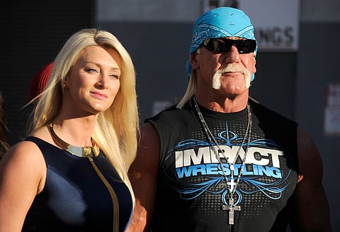 Pro wrestler Hulk Hogan (right) and guest arrive at Spike TV's "2011 Video Game Awards" at Sony Studios on December 10, 2011 in Los Angeles, California.